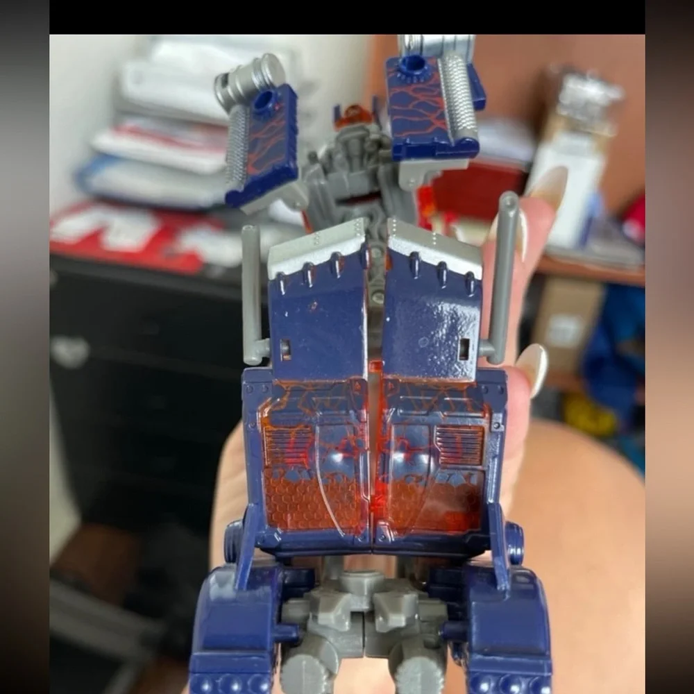 Hasbro Transforming Robot - Red, Blue, and Silver